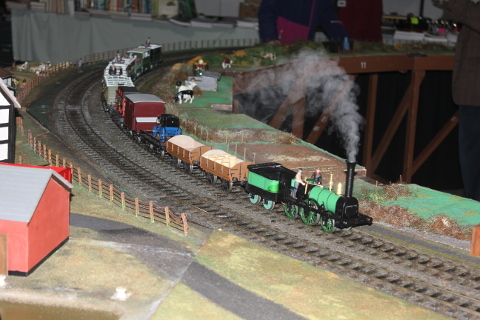 Photo of Model Stephenson's 'Patentee' Harvey Combe with train